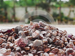 Brown Zicron nature Mineral Gemstones roughÂ  crystals healing group on white background